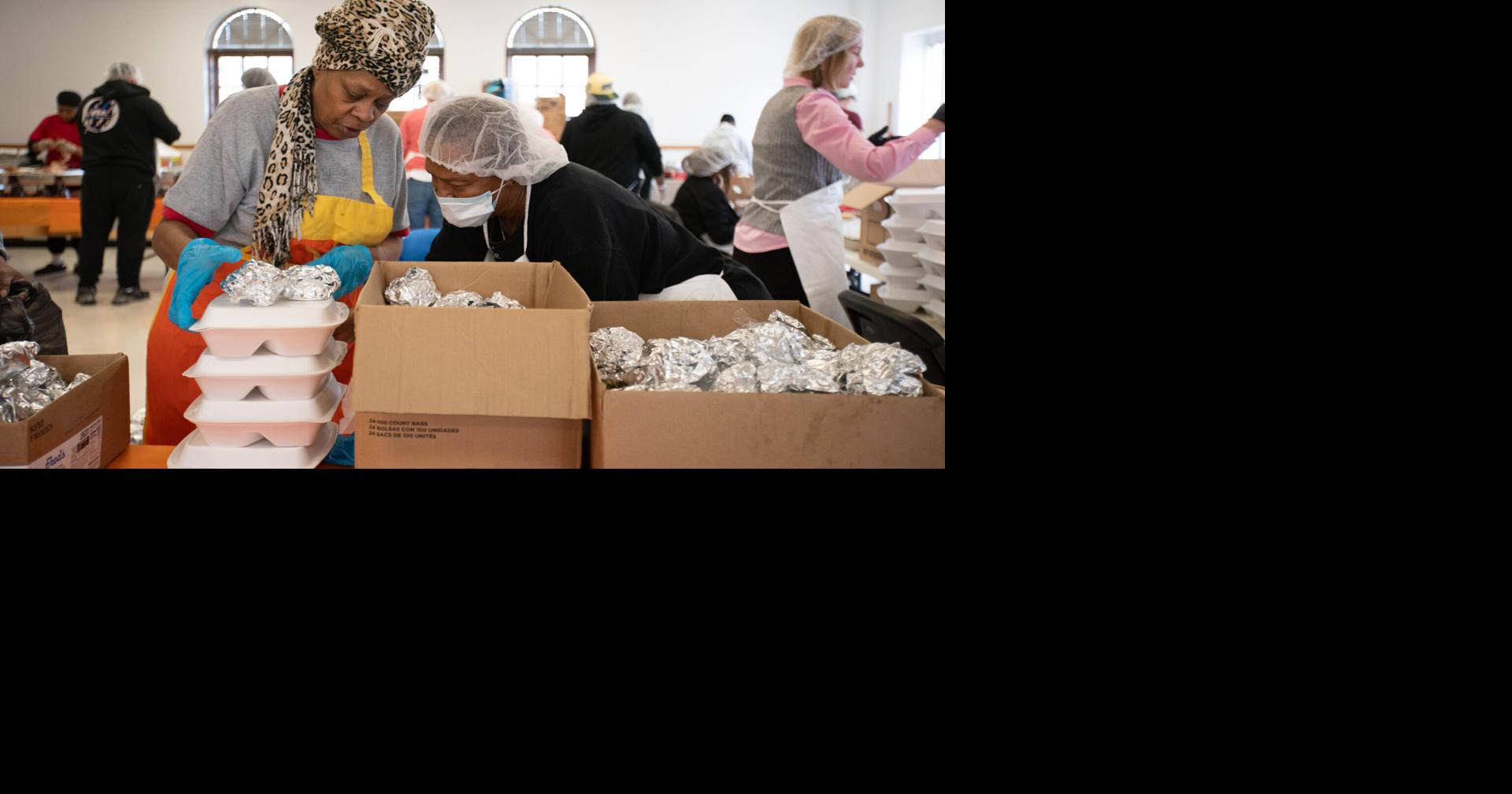 Photos: Volunteers prepare meals for BMHA Friendsgiving