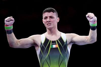 Irish gymnast jumps on Olympic Village cardboard bed to ...