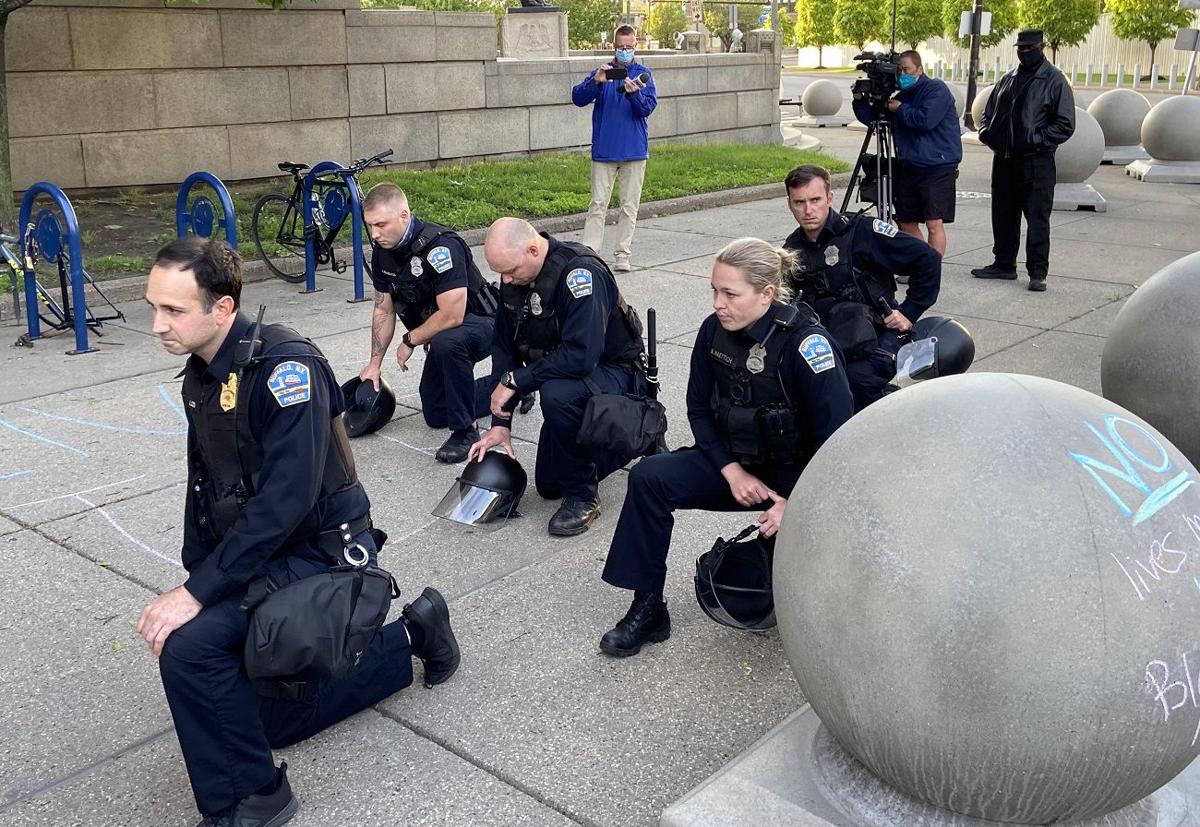 Watch Now Five Buffalo Police Officers Kneel With Protesters