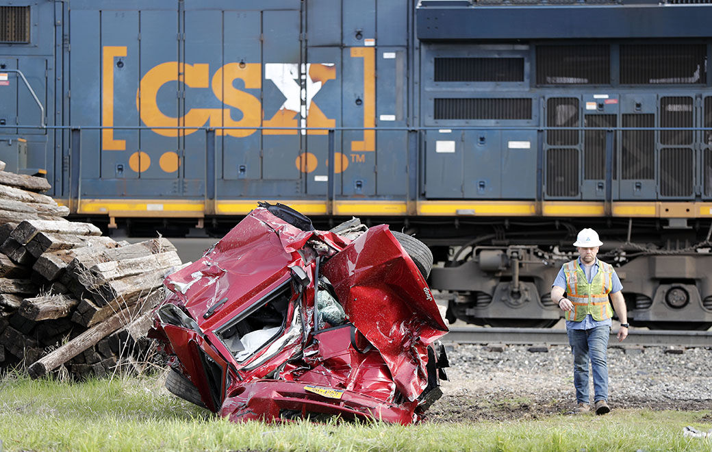 Train collides with unoccupied car on Buffalo's East Side