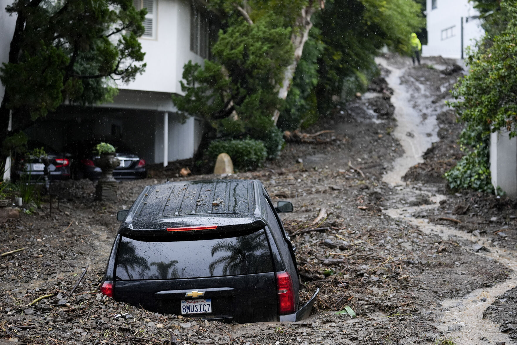 Historic storm sends debris through LA's Hollywood Hills