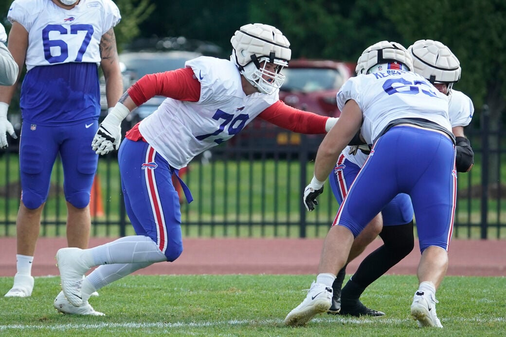 Buffalo Bills tackle Spencer Brown (79) runs onto the field before