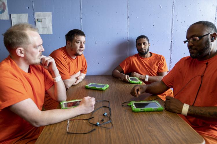 Behind bars and online Computer tablets for inmates seen as tool to educate, improve behavior