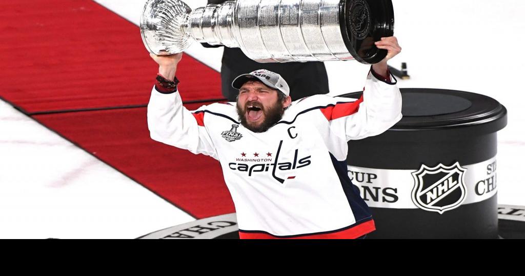 Stanley Cup Final 2018: Capitals' Alex Ovechkin hands Stanley Cup to  Nicklas Backstrom
