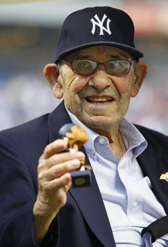 New York Yankees legend Yogi Berra dies at 90