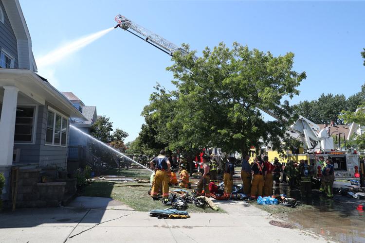 Fire rips through Kenmore house, causes extensive damage next door