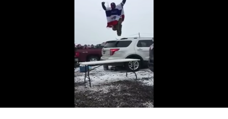 Buffalo Bills fan breaks his leg by jumping off a car roof onto a