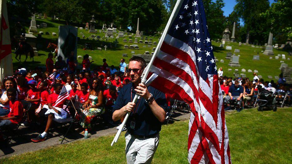 Sean Kirst Amid Senseless Bloodshed On Flag Day Educators Cling