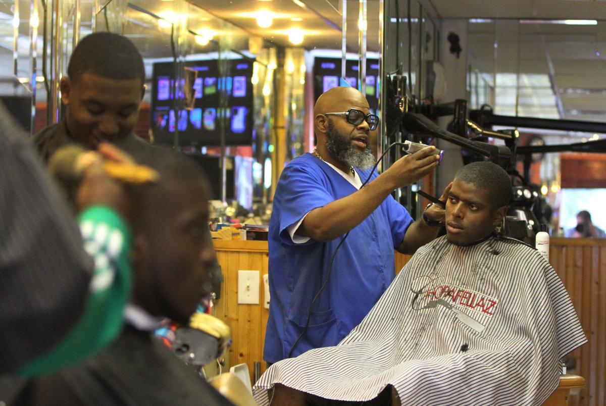 Black barbershops draw customers back with a blend of camaraderie ...