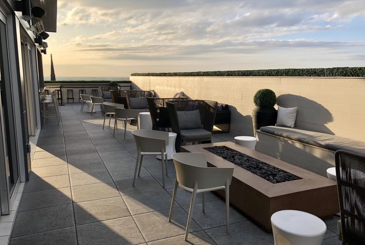 Outdoor dining area Patrick's Rooftop