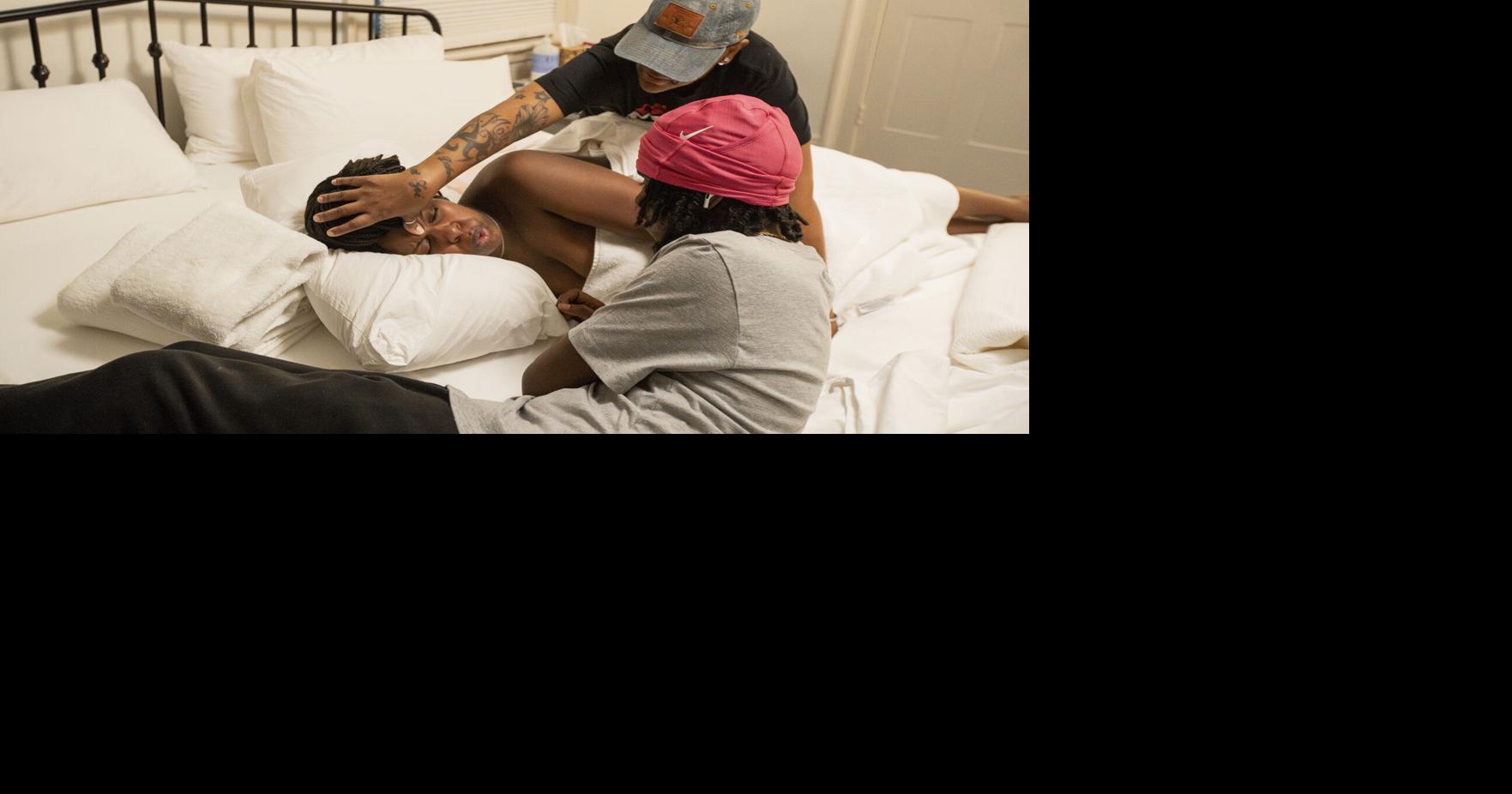 Uneasy about hospitals, she chose a midwife-led birth center in Buffalo for her care