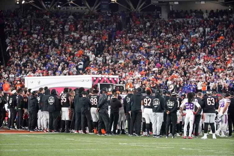 Gut-wrenching': Bills fans in Cincinnati react with shock, horror