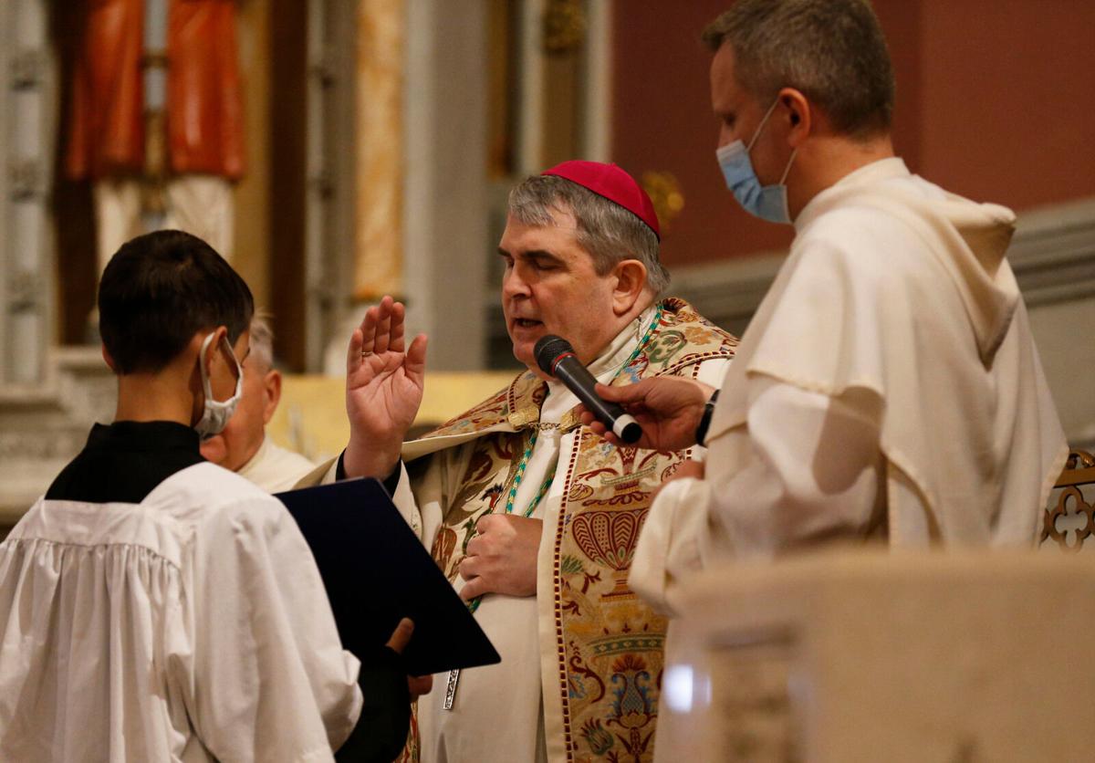 Bishop performs the blessing (copy)