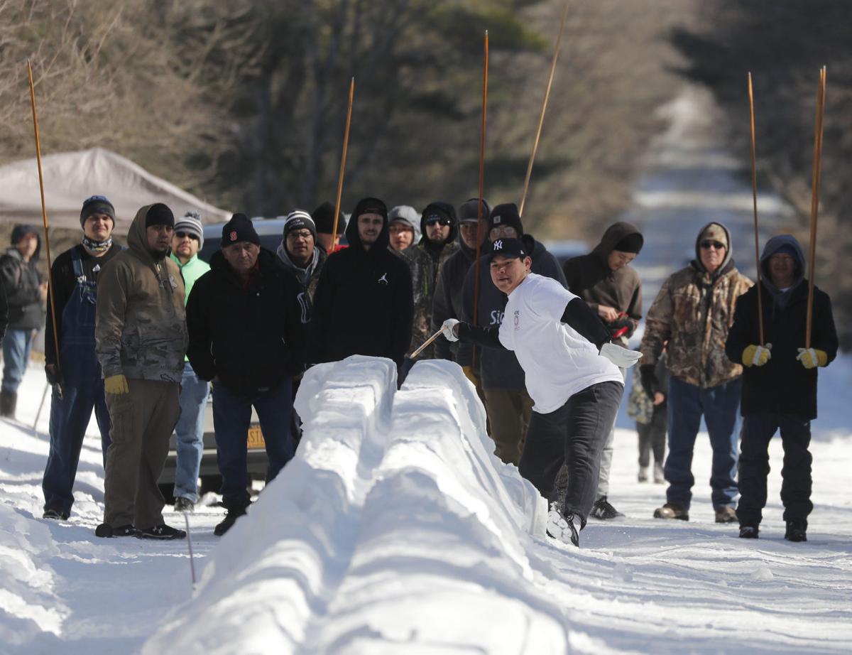In Six Nations game of 'snow snake,' bonds as strong as fathers and