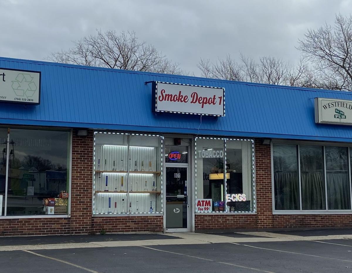 Police charge Amherst smoke shop employee with attacking, robbing customer