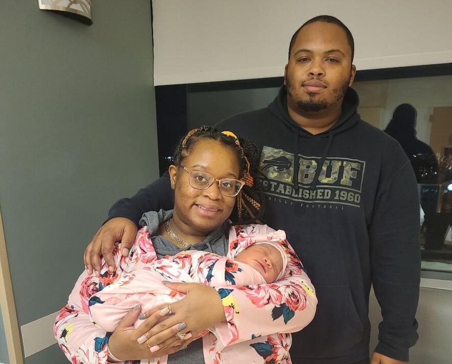Erica and Davon Thomas with their baby girl, Devynn
