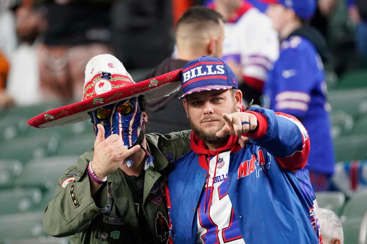 Denver Broncos vs. Buffalo Bills. Fans support on NFL Game. Silhouette of  supporters, big screen with two rivals in background Stock Photo - Alamy