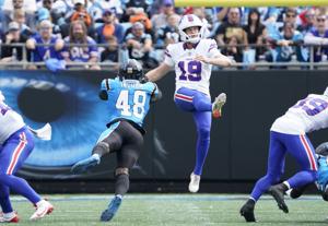 Buffalo Bills punter Mitch Wishnowsky embraces the cold