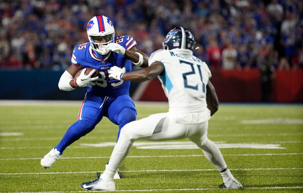 Buffalo Bills tight end Quintin Morris runs on the field during the first  half of a preseason NFL football game against the Denver Broncos in Orchard  Park, N.Y., Saturday, Aug. 20, 2022. (