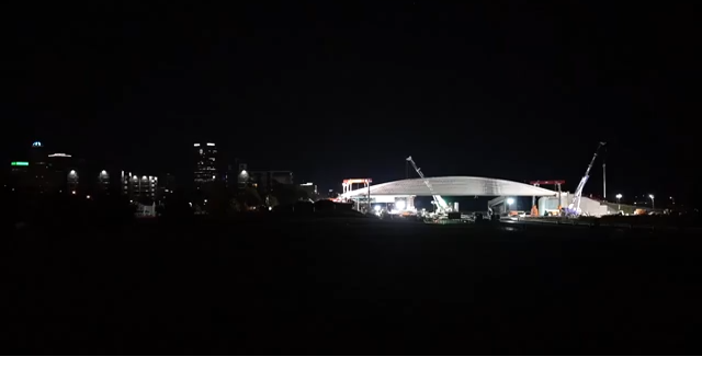 Crews install new Ralph Wilson Park pedestrian bridge