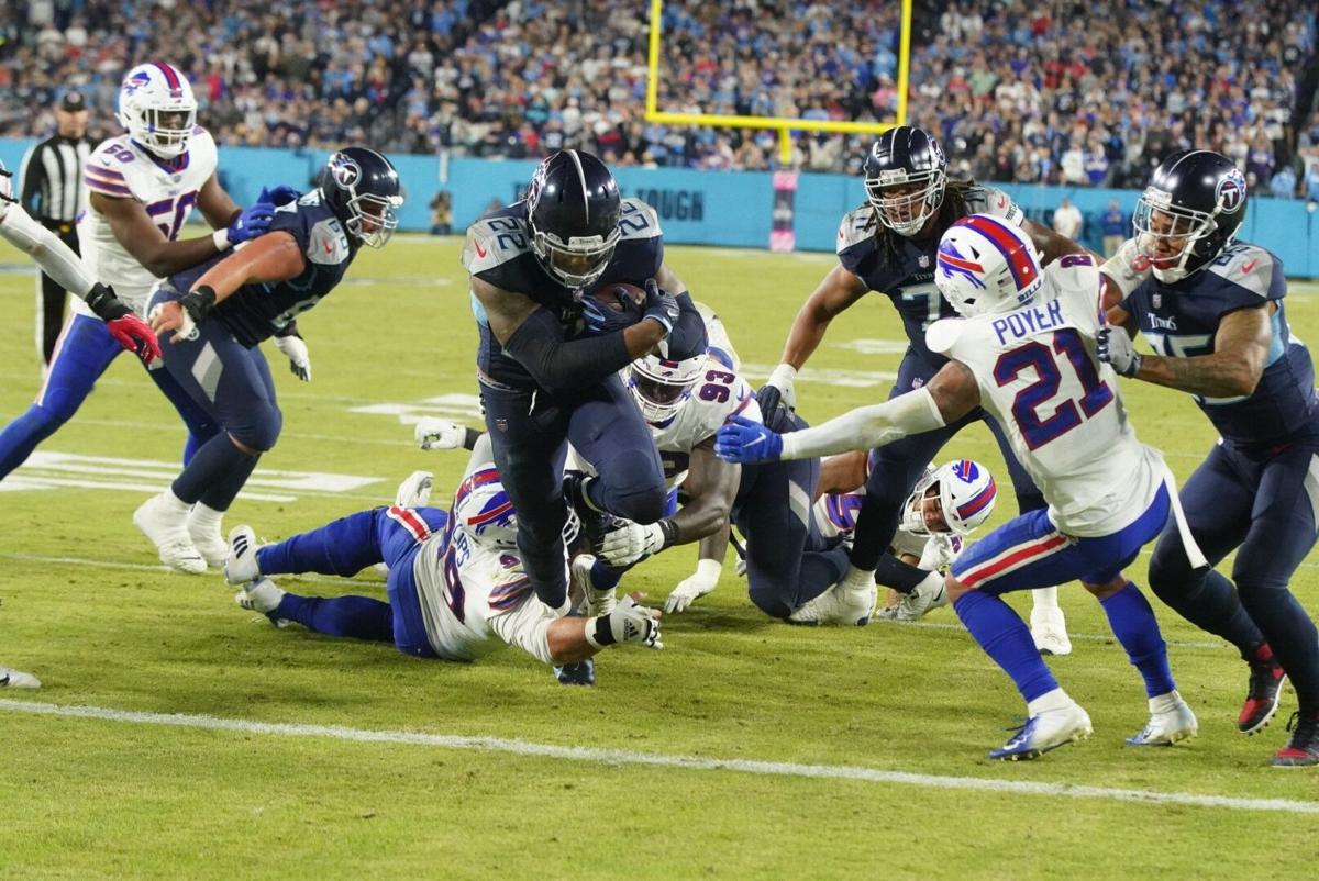 Titans use Derrick Henry, goal-line stand to hold off Bills 