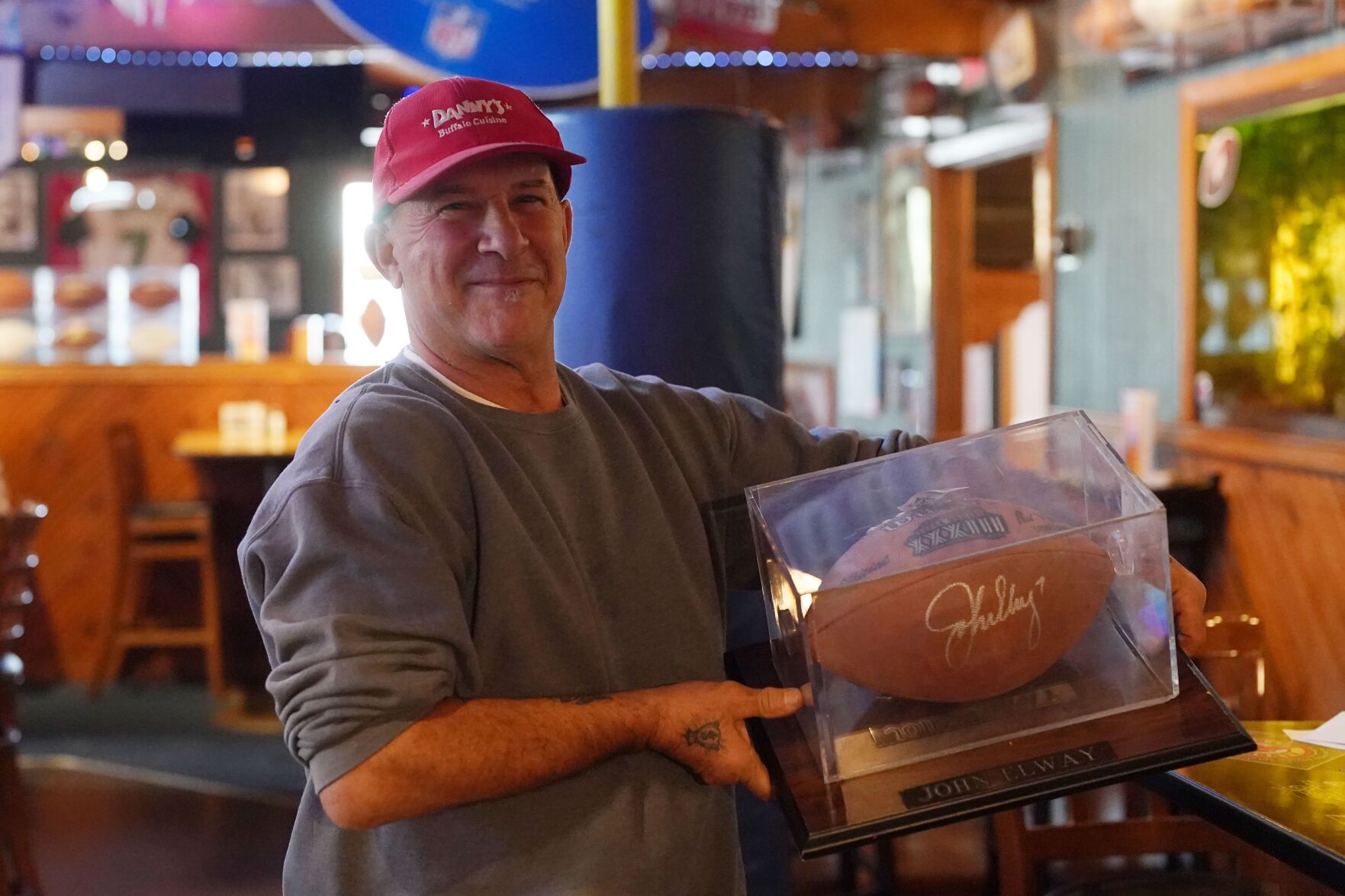 Stolen Elway football returned to Buffalo bar restaurant