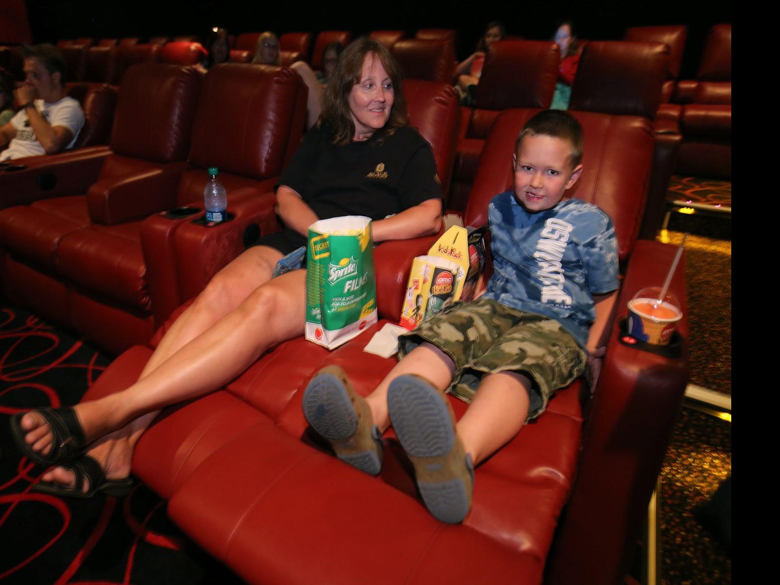 Amcs Comfort Revolution Brings Red Leather Recliners To Compete With Your Living Room Movie Experience Local News Buffalonewscom