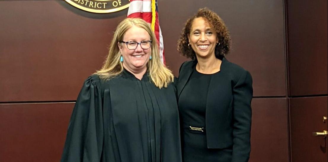 U.S. Chief Justice District Judge Elizabeth Wolford (left) swears in Trini E. Ross as U.S. Attorney for the Western District of New York on Monday