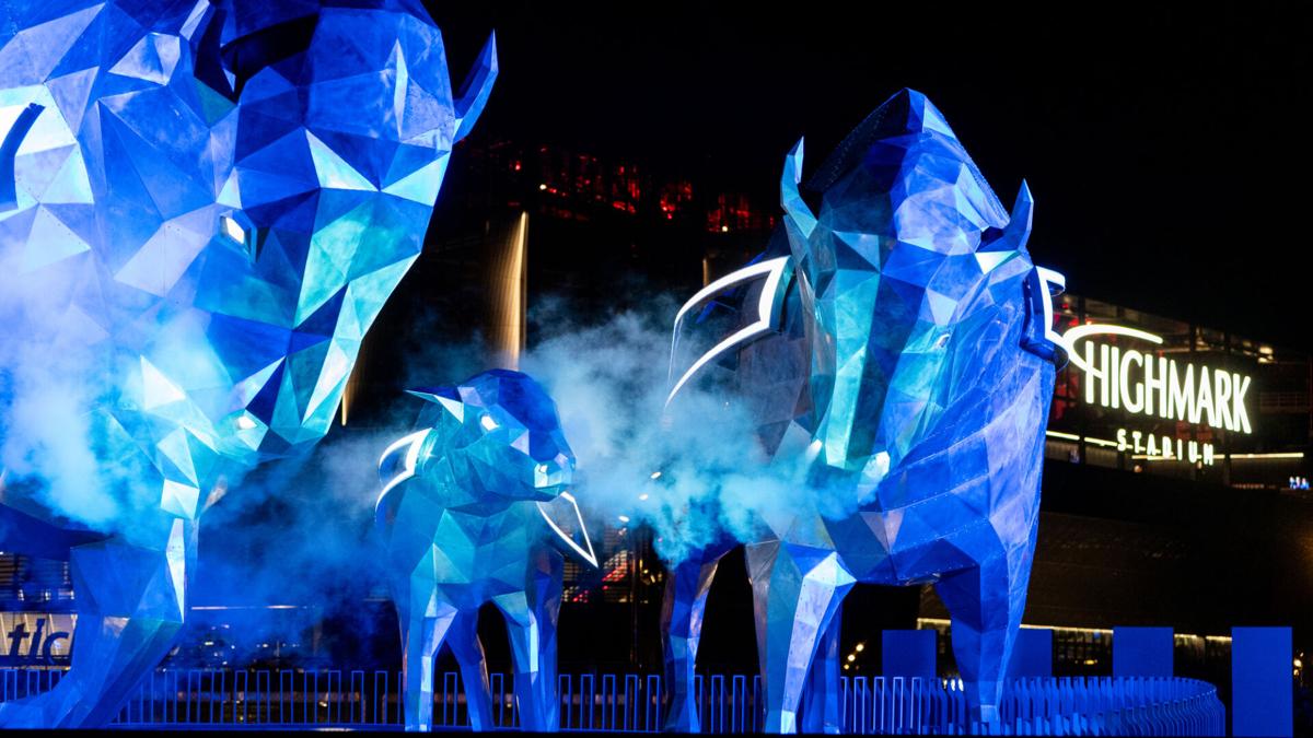 Photos and video: Towering bison statues at new Bills stadium light up in dramatic display
