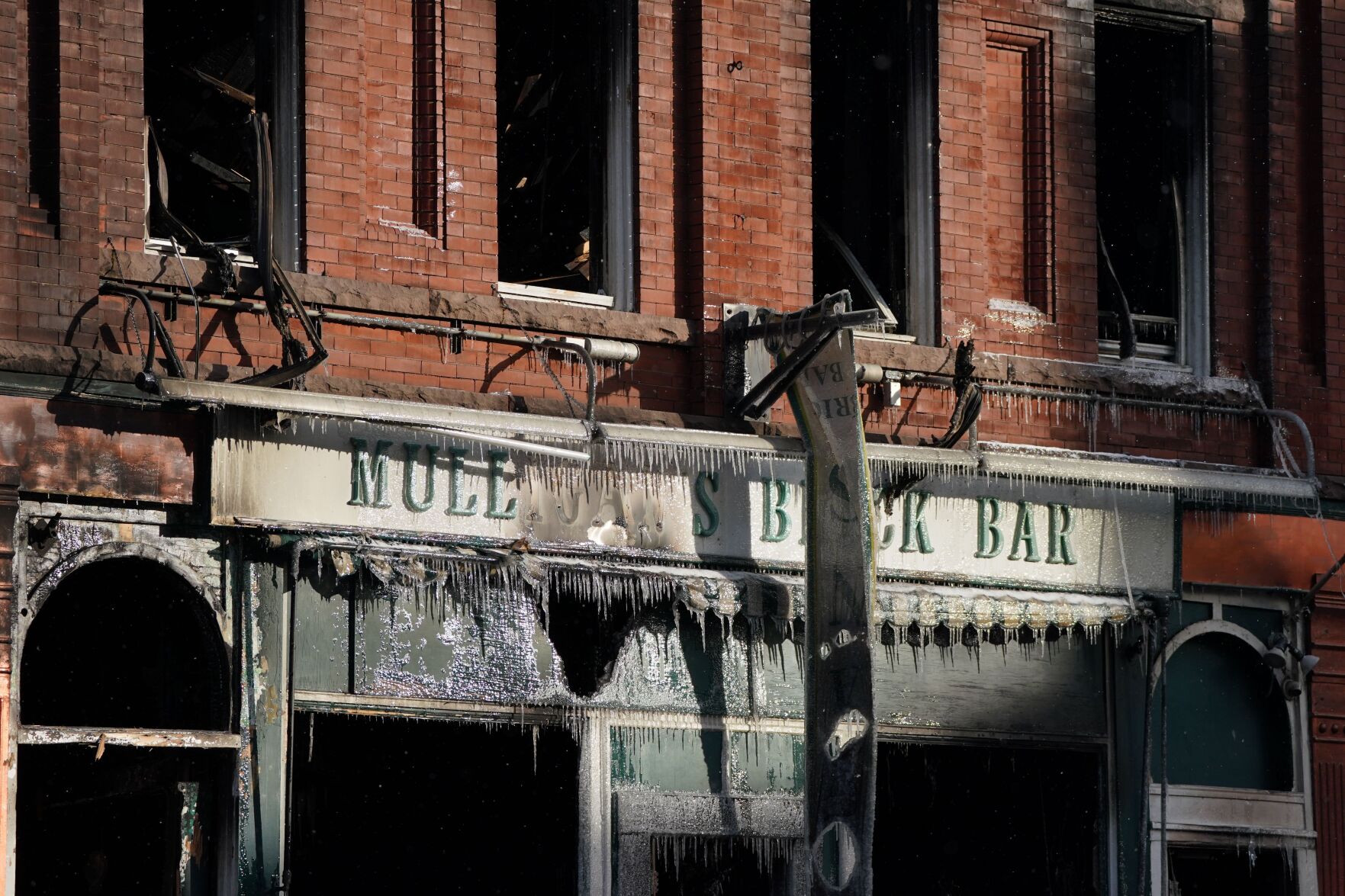 Photos: Demolition of Mulligan's Brick Bar