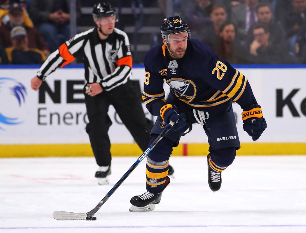 Sabres re-sign Zemgus Girgensons, four 