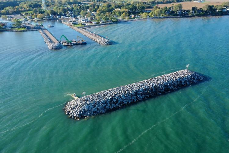 New breakwall in Olcott prompts first new development a hotel and retail shops