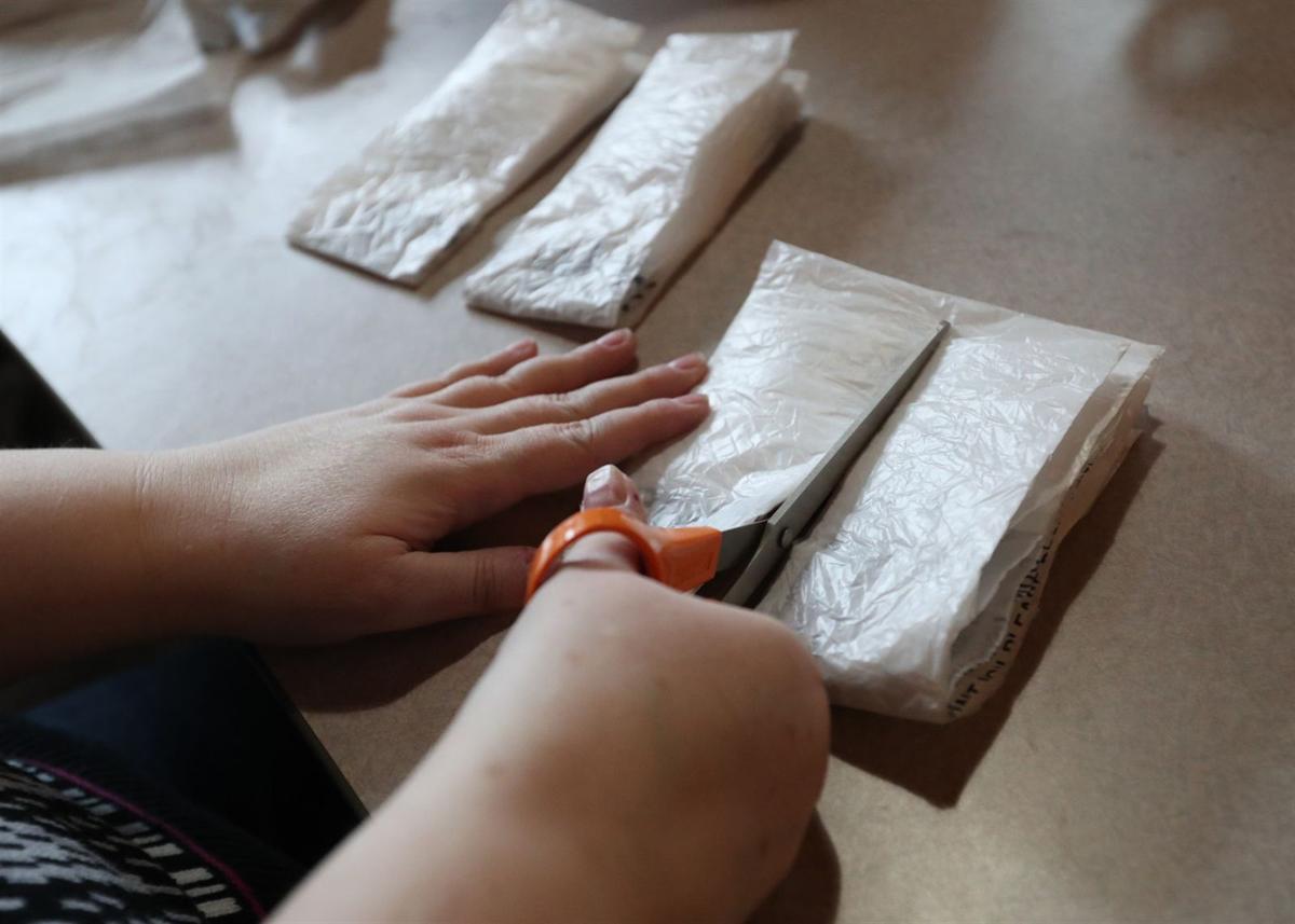 Recycling plastic bags into sleeping mats for the homeless