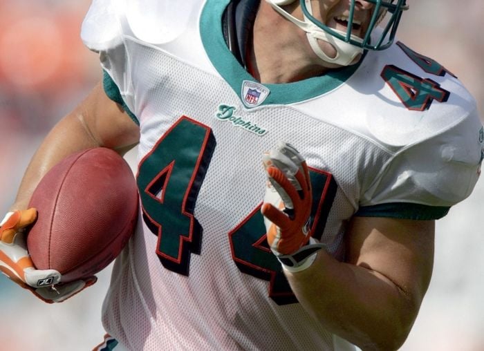 Denver Broncos tight end Mike Leach pulls in a pass during