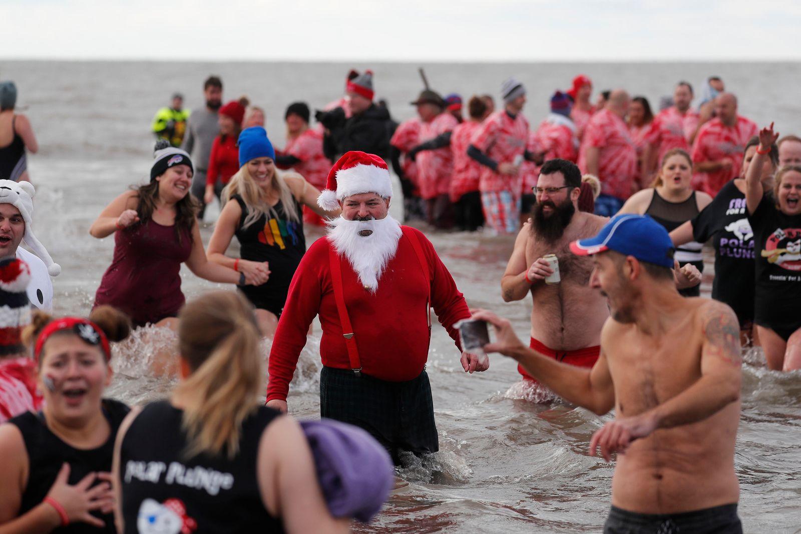 Brave participants take the 13th annual Buffalo Polar Plunge