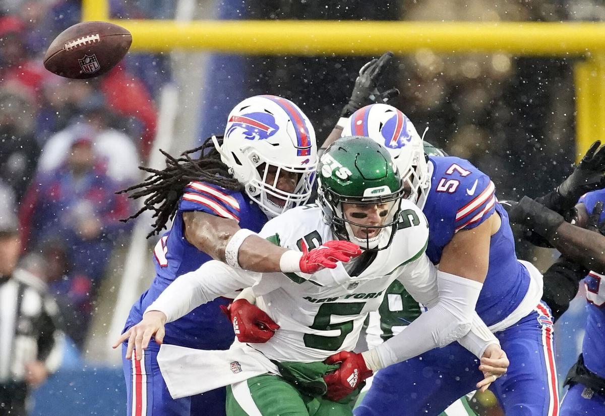 Buffalo Bills defensive end A.J. Epenesa (57) walks off the field after an  NFL football game against the New York Jets, Sunday, Nov. 14, 2021, in East  Rutherford, N.J. (AP Photo/Adam Hunger