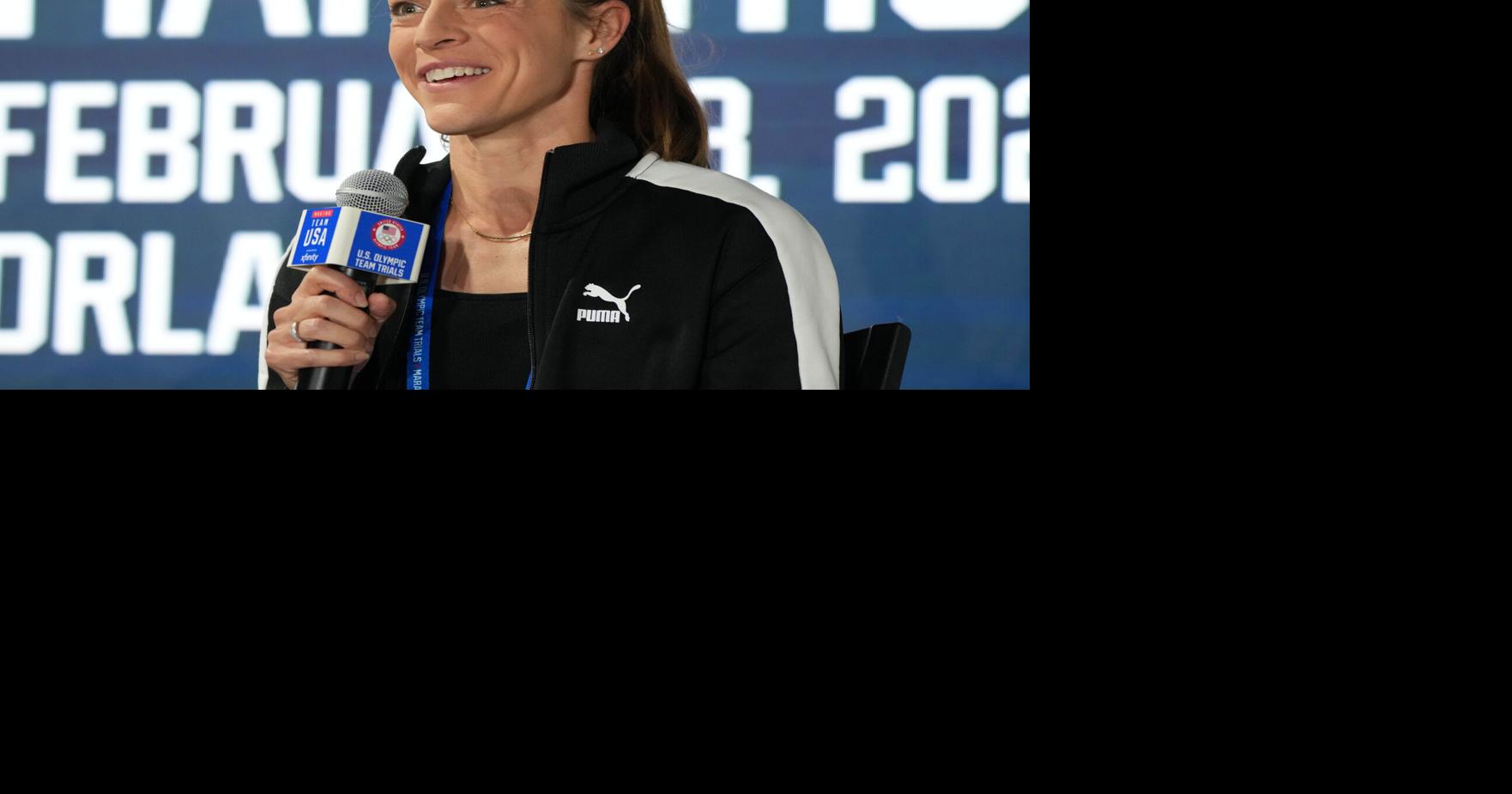 Jenny Simpson speaks at a press conference in 2024.