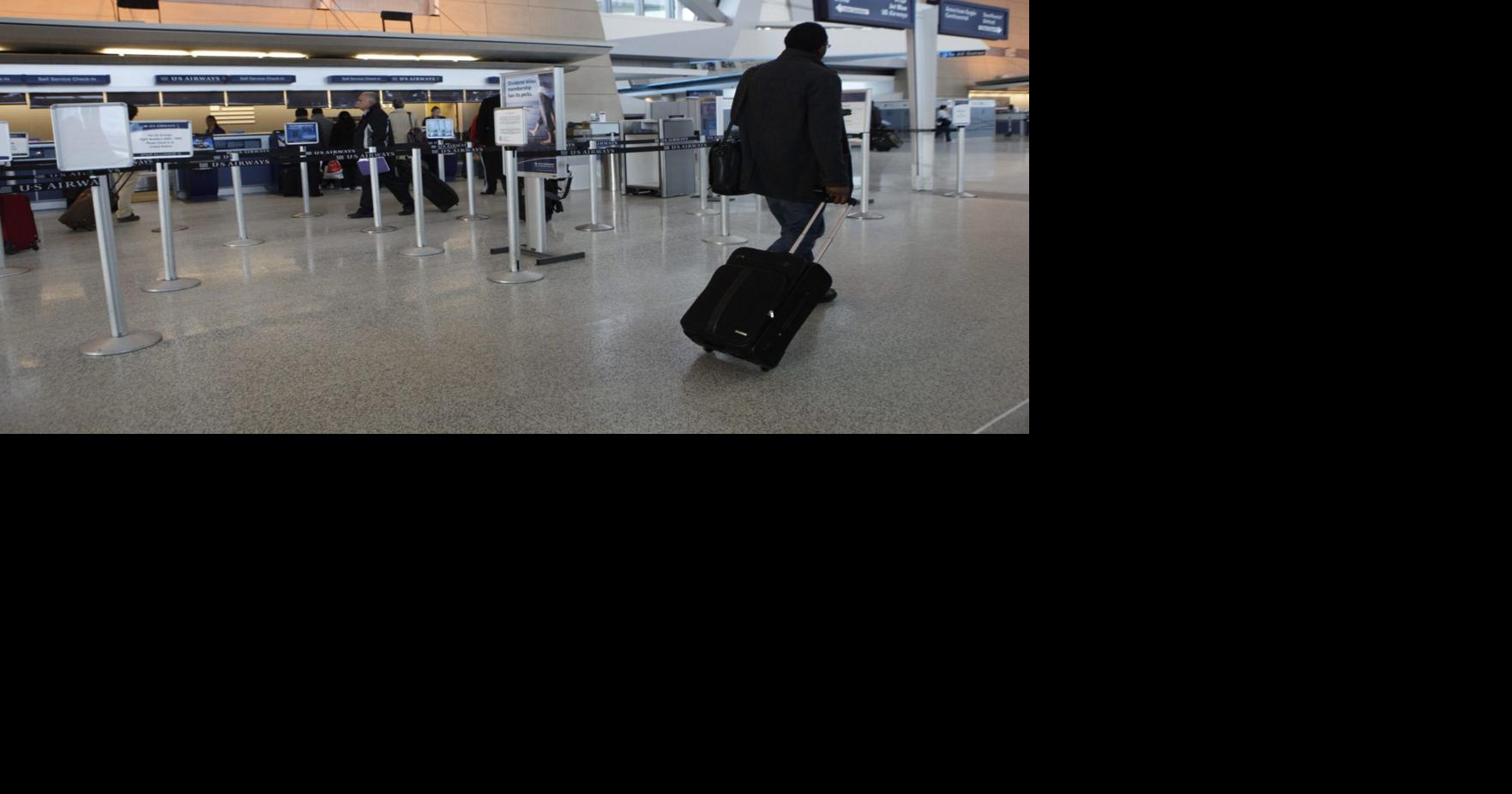 Woman arrested at airport after loaded handgun found in carry-on luggage