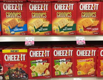Several boxes of Cheez It crackers on a grocery shelf