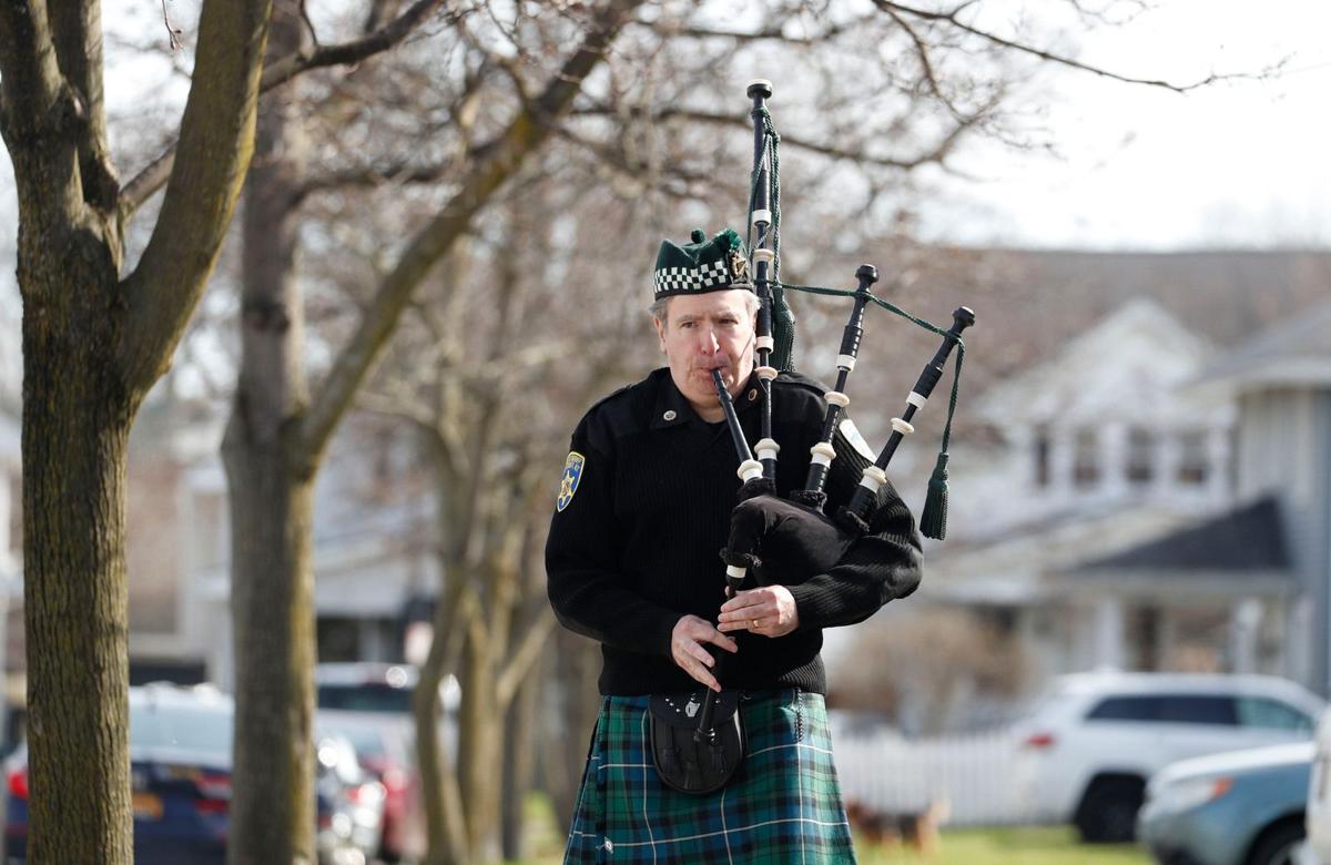 The sound of bagpipes cheers neighborhoods
