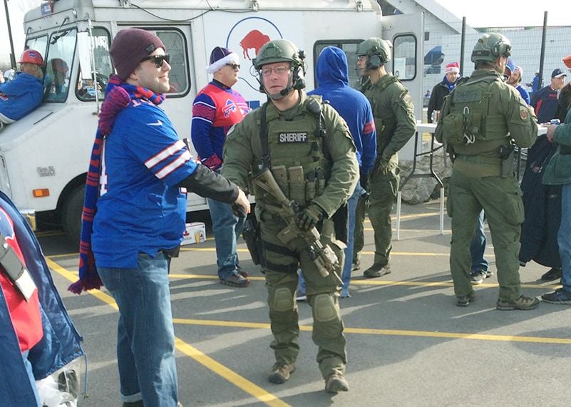 Bills-Texans Tailgate Report: Cellino & Barnes sweatshirts, SWAT team  members and Flutie love