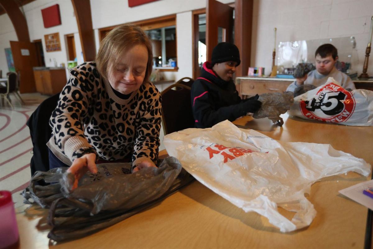 Recycling plastic bags into sleeping mats for the homeless