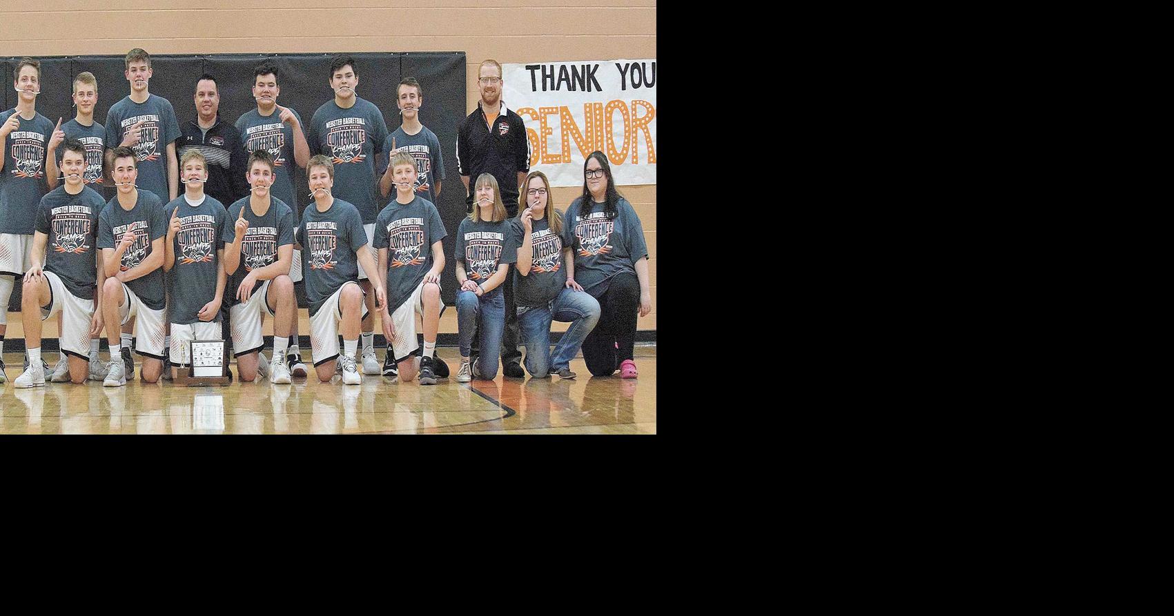 The Webster Tigers basketball team pose for a picture with their ...