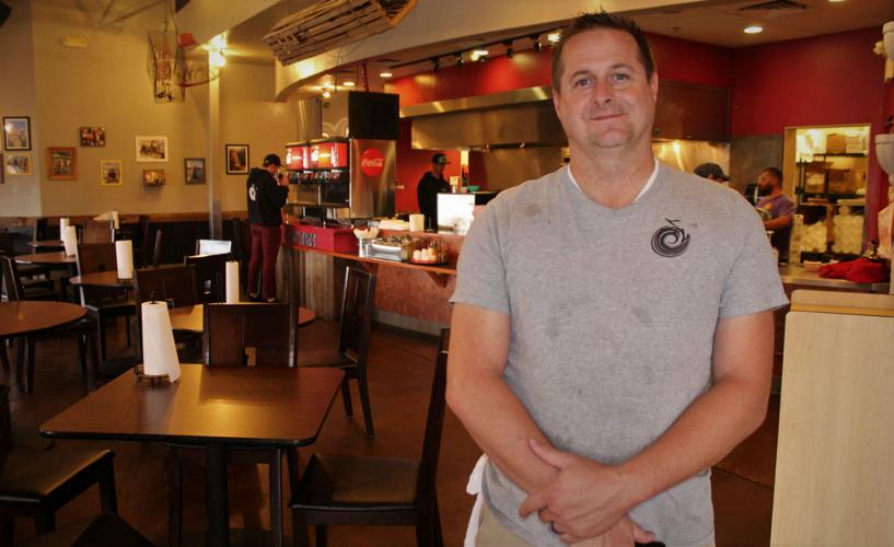 Diners, DriveIns and Dives host pays MayMoes Cajun Grill a visit