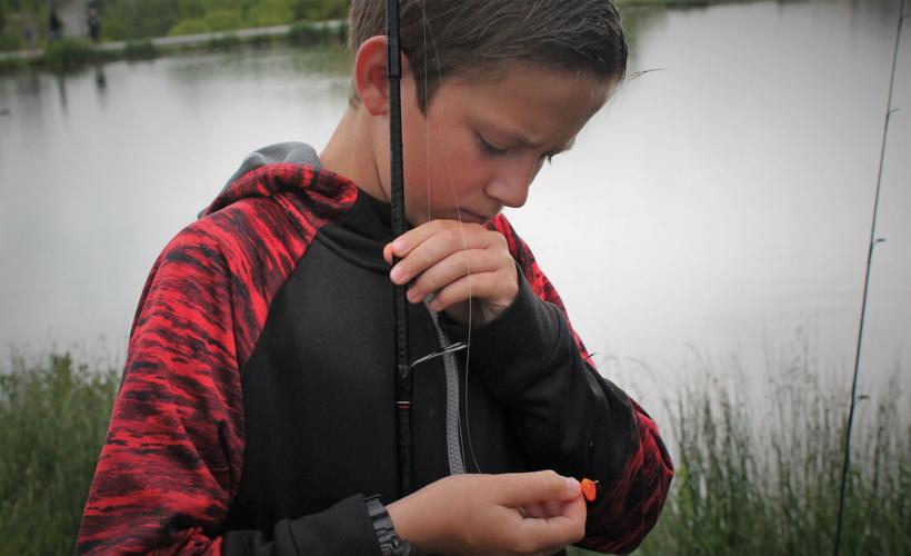 Fifth graders release trout in Wellsville Pond Local News