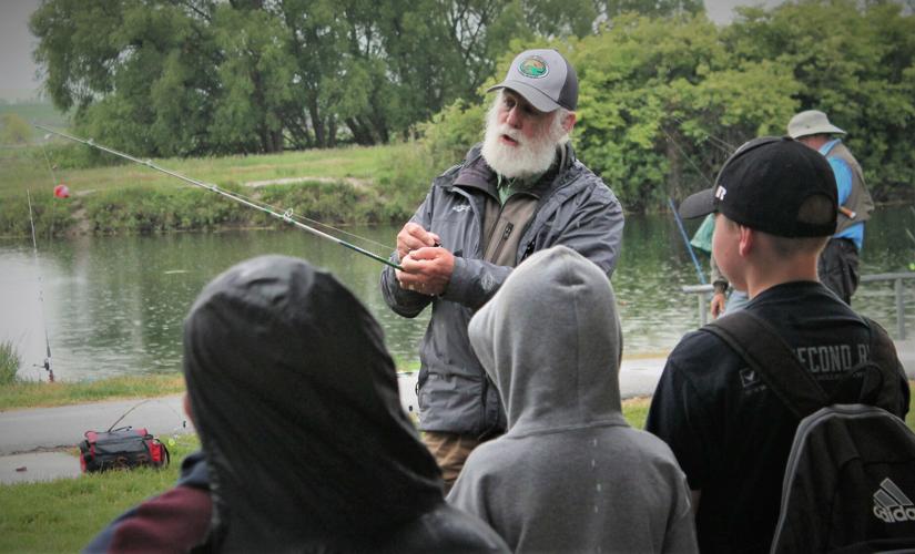Fifth graders release trout in Wellsville Pond Local News