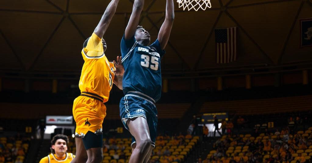 Utah State escapes disaster, holds off late Wyoming rally