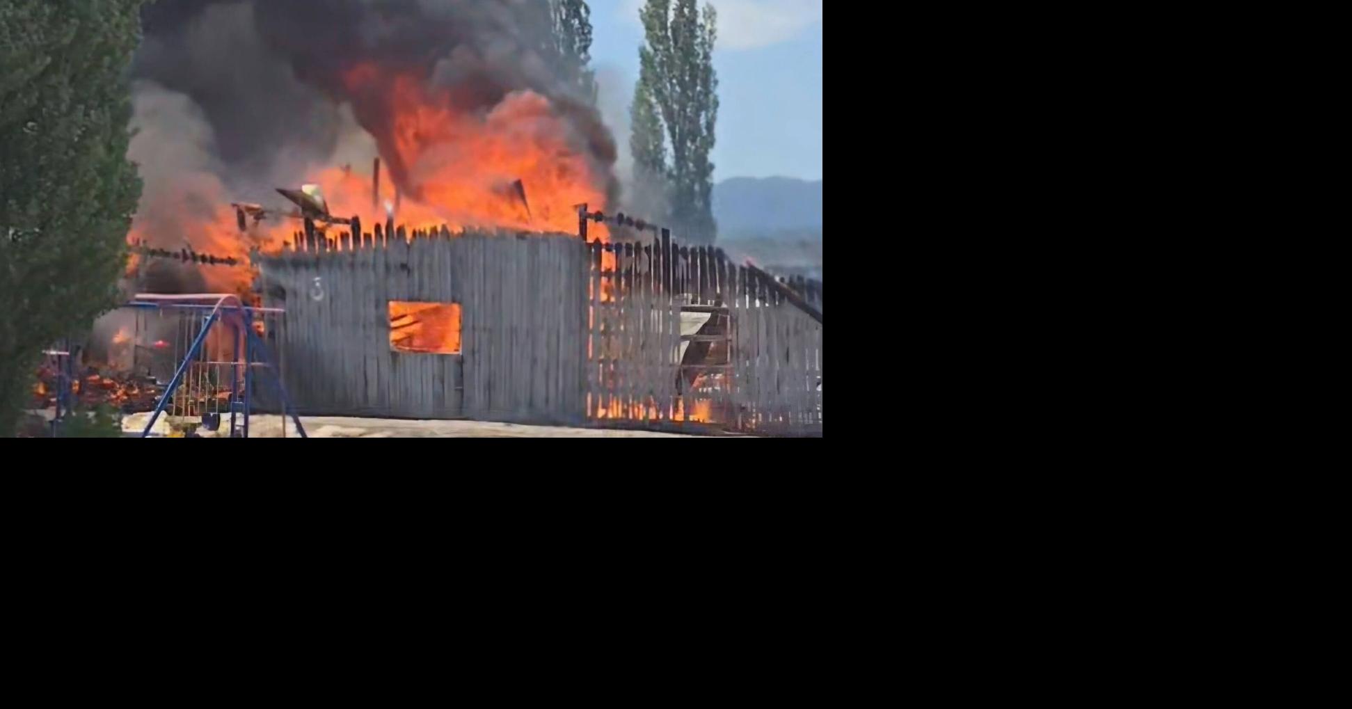 Firefighters battle fully engulfed barn fire in Wellsville