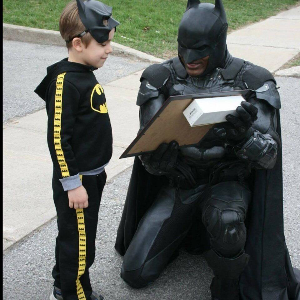 VIDEO: Brampton Batman works with Caledon OPP to enforce distracted driving  laws, takes selfie with officer