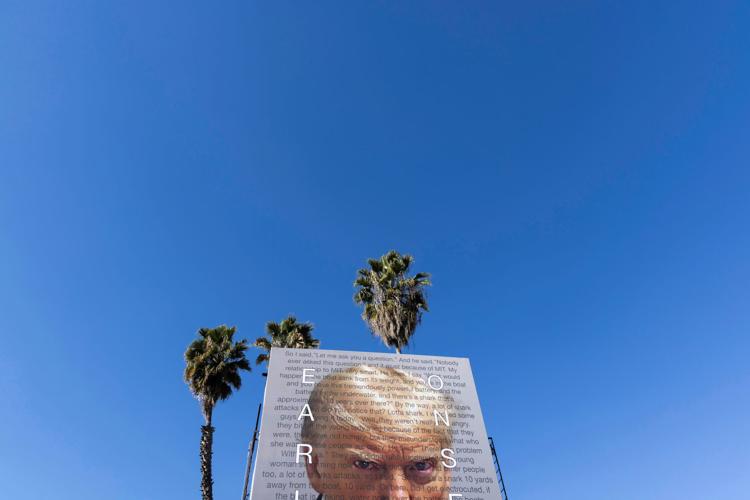 A billboard featuring Donald Trump’s arrest mugshot photo - Capital & Main